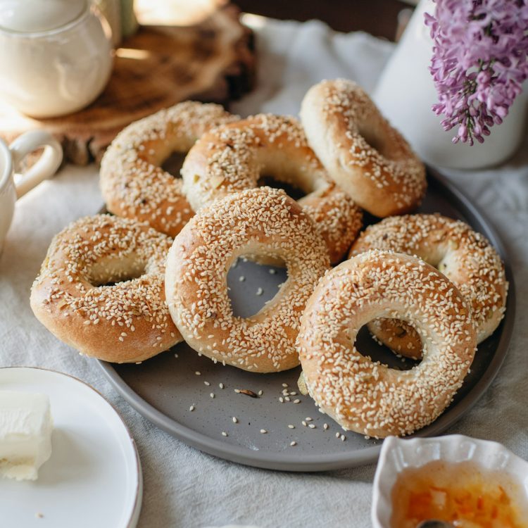 a plate of bagels with sesame, a nutritious and satisfying breakfast